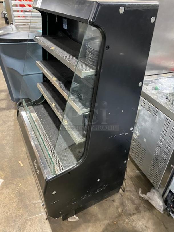 Turbo Air TOM-40M(B) black refrigerated open merchandiser. Multi-tier, signs of wear, 120V, 1 phase, SN: TMM40146009.