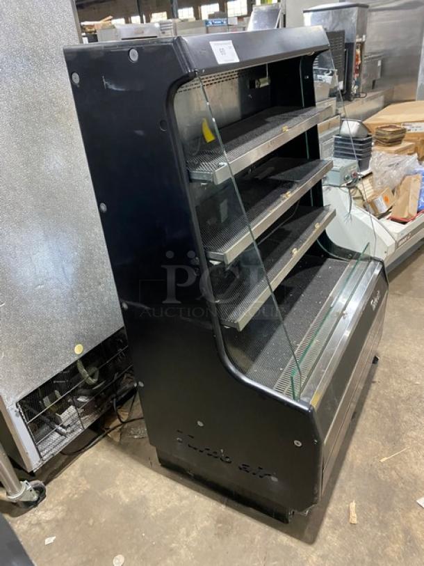 Turbo Air TOM40MB black multi-tier refrigerated open display case, used condition, serial TMM40146009, 120V 1 Phase.