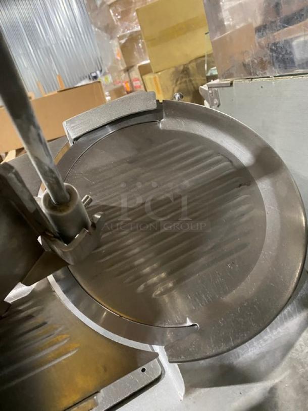 Fleetwood Commercial Stainless Steel Deli Meat Slicer, Model 412/B, 115V, 1 Phase, in used condition.