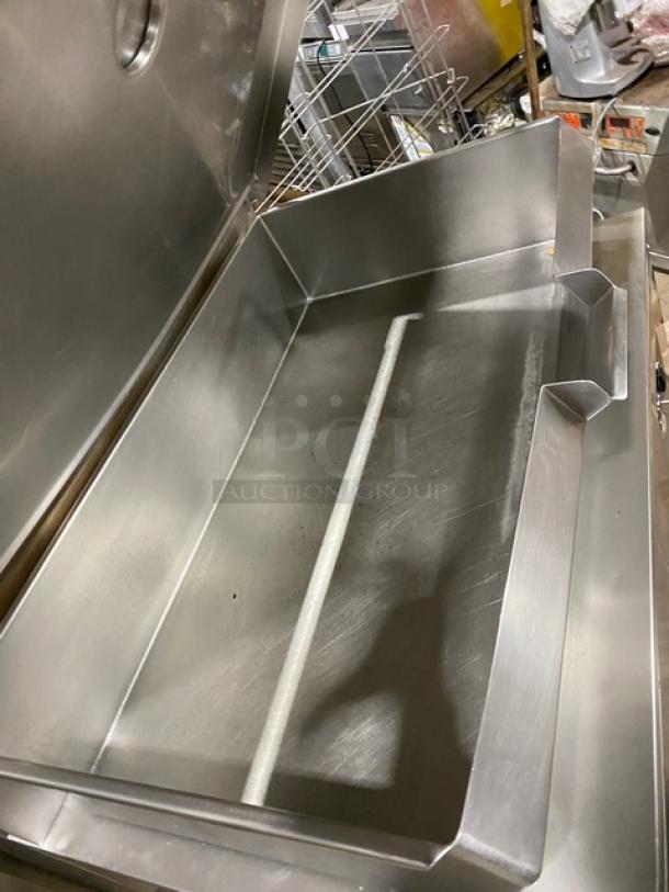 Cleveland Range commercial stainless steel tilted braising pan with lid and legs, excellent condition, ideal for large-scale cooking.