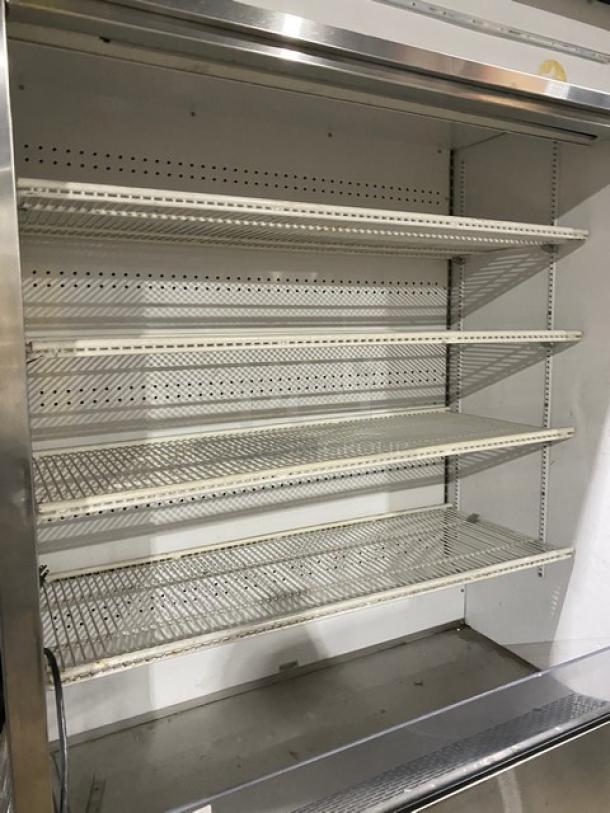True Commercial Stainless Steel Multi-Tier Refrigerated Open Merchandiser, Model TAC48LD, adjustable shelves, on legs.