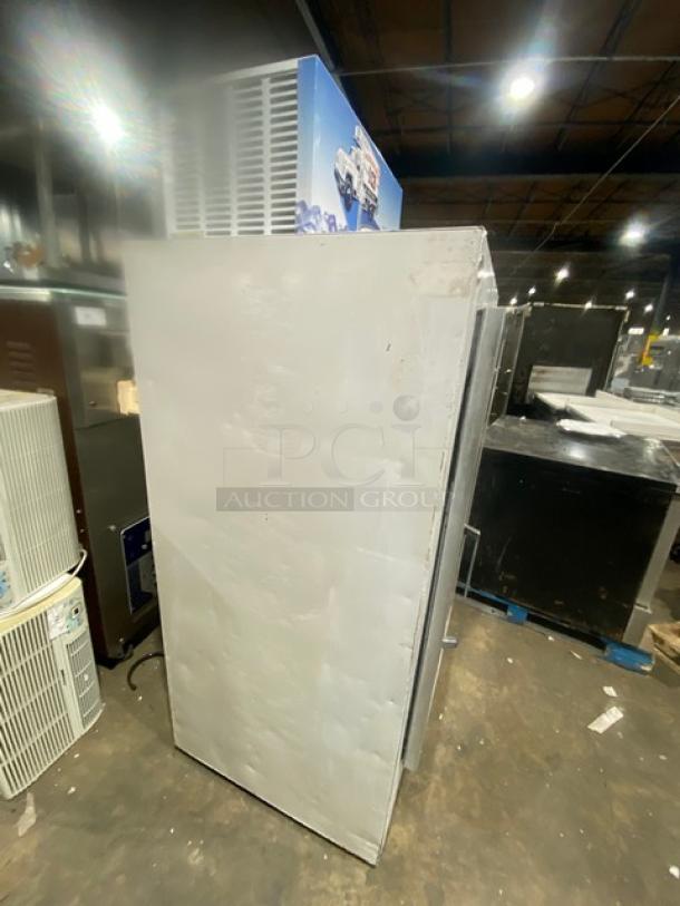 Leer Commercial White Single Glass Swing Door Reach-In Ice Merchandiser Freezer, Model 301UC25MG, in warehouse setting.