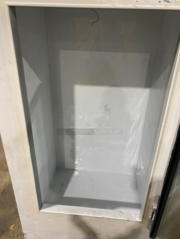 Leer Commercial Ice Merchandiser Freezer model 301UC25MG, single glass swing door, white interior, 115V, SN: HAA-0404.