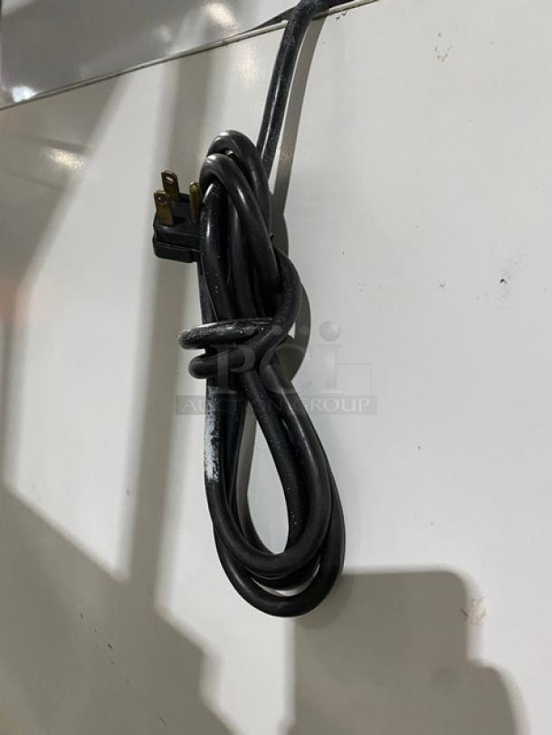 Leer Commercial Ice Merchandiser Freezer, Model 301UC25MG, 115V, white exterior, shows single glass swing door, coiled power cord.