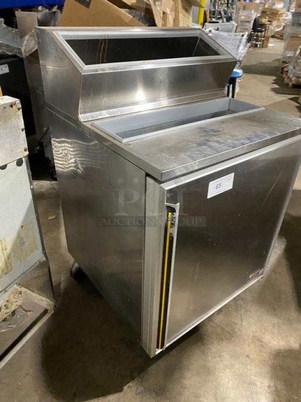 Silver King SKFSM/C7 stainless steel refrigerated ice cream topping fountainette. Features single door, poly-coated rack, on casters.