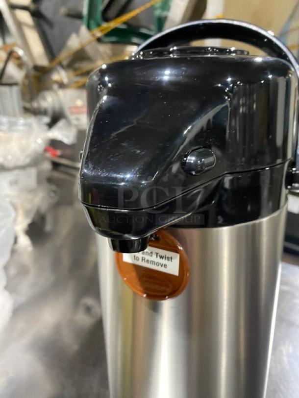 Winco Winware APSP925 stainless steel airpot, 2.5L, satin finish, double-wall insulated, push button, swivel base, color tabs.