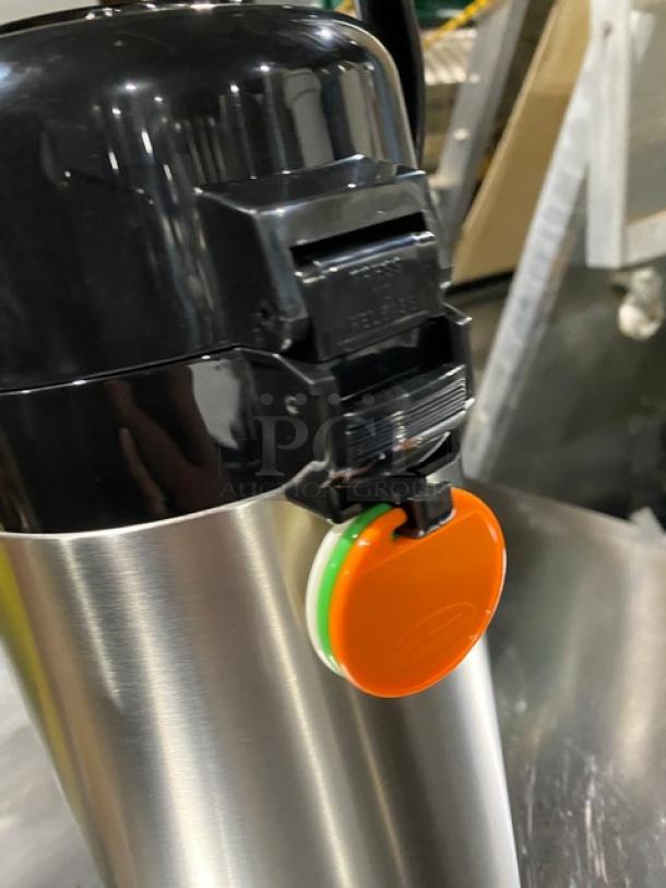 Winco APSP925 Airpot, stainless steel, push button, swivel base, color tabs, new condition.