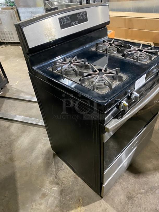 Amana Commercial 4-burner stainless steel/black natural gas range/oven combo with digital controls and wired oven rack.