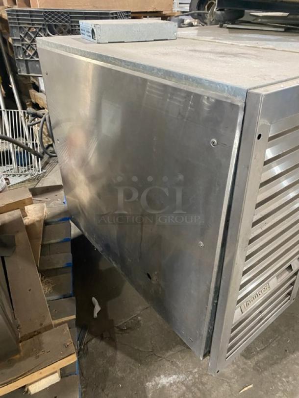 Traulsen UC2HT stainless steel 2-door undercounter refrigerator, 69", with pan slide, chrome rack, on legs. 115V, 1 phase.