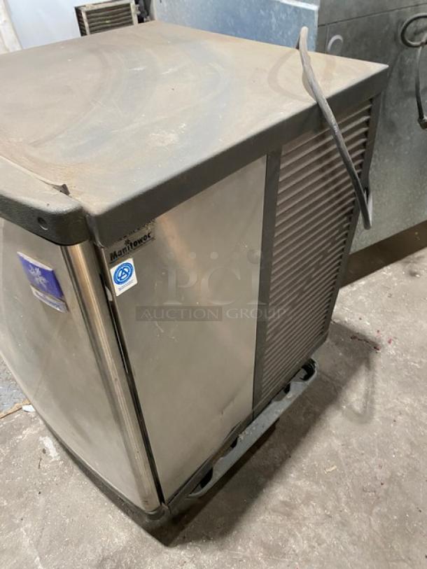 Manitowoc QY0425W stainless steel water-cooled ice maker, electric, 115V, 1 phase, visible dust, needs cleaning.