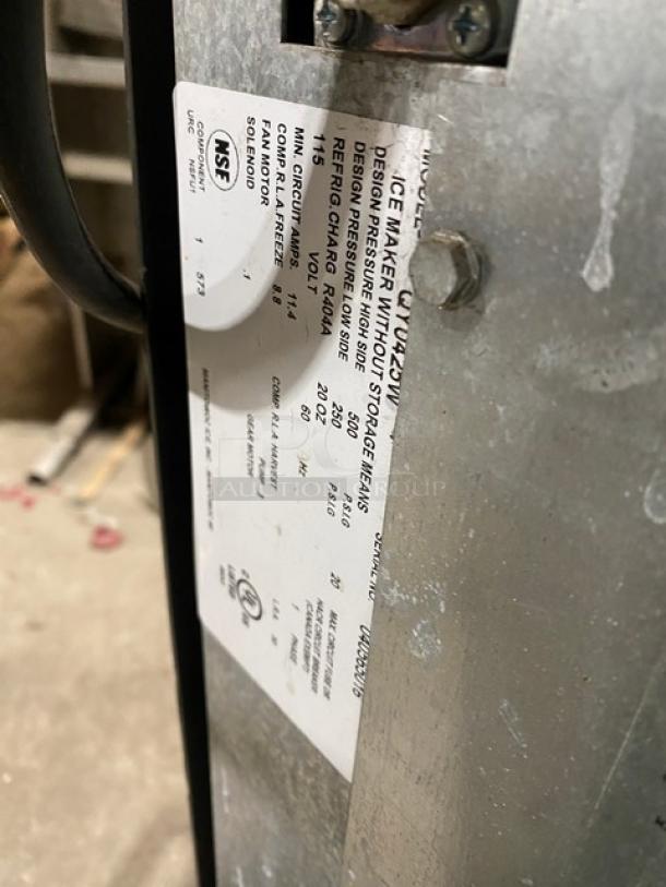 Manitowoc stainless steel ice maker, model QY0425W, electric water-cooled, model label visible, 115V, 1 phase.