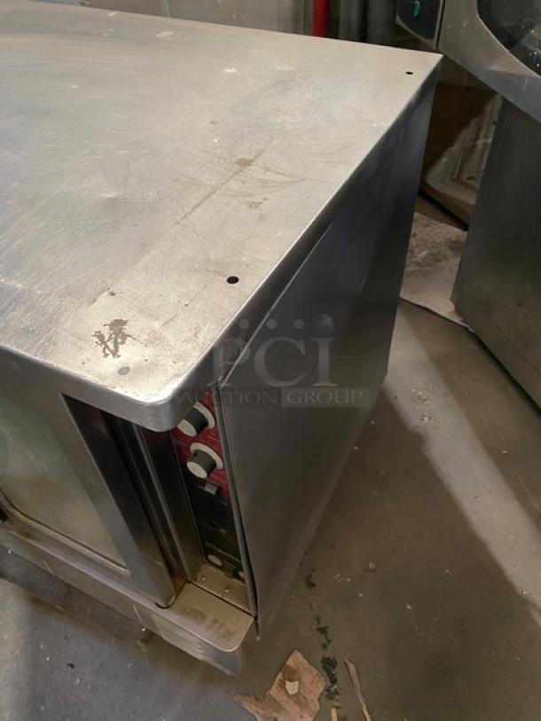 Southbend Marathoner Gold Series stainless steel convection oven, single stack, includes wired rack, visible knobs, minor wear visible.