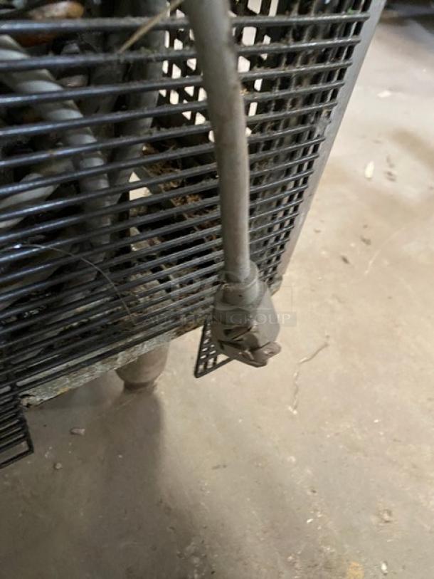 Delfield stainless steel undercounter refrigerator model 406CADHLDD1; features include coated wired rack, on casters, 115V, 1 phase.