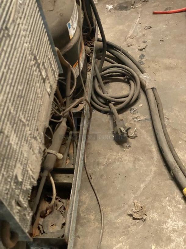 Delfield stainless steel single door refrigerator model 406CA-DHL-DD1. Features coated wired rack and casters. 115V 1 Phase.