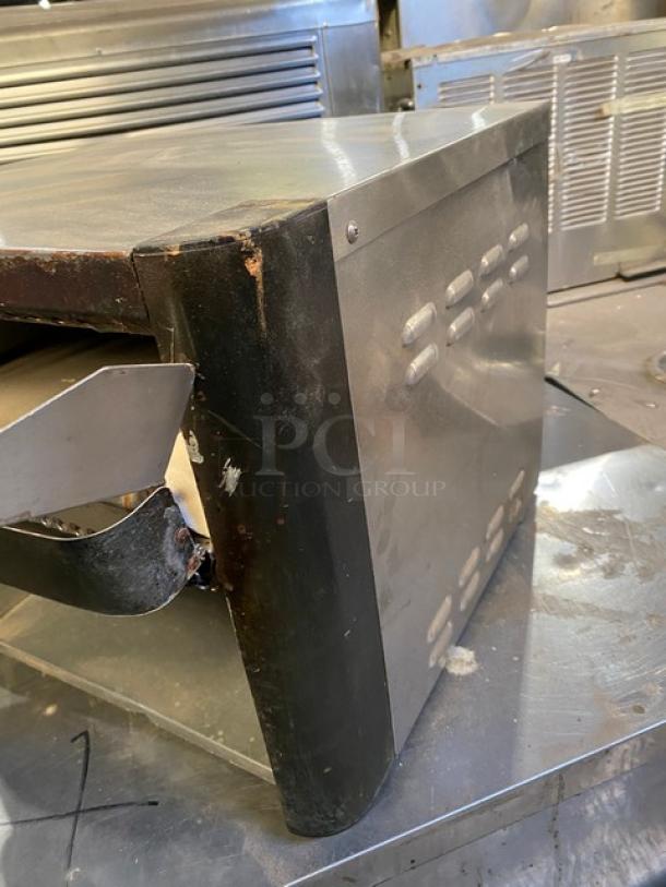 APW Wyott XTRM3H conveyor toaster, stainless steel, 13" wide belt, 3" opening, commercial use, visible wear, Model XTRM3H.