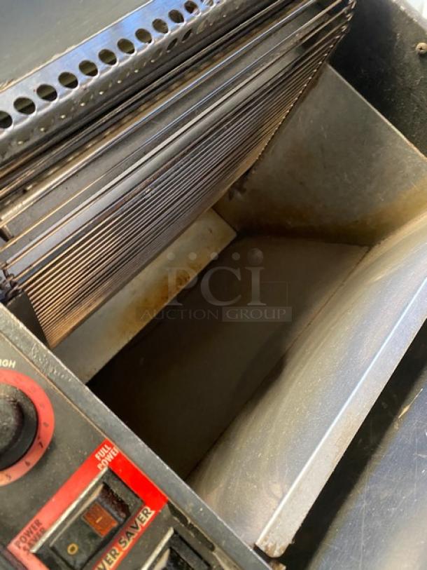 APW Wyott XTRM3H stainless steel countertop conveyor toaster, 13" belt, 3" opening, shows light wear, model details visible.