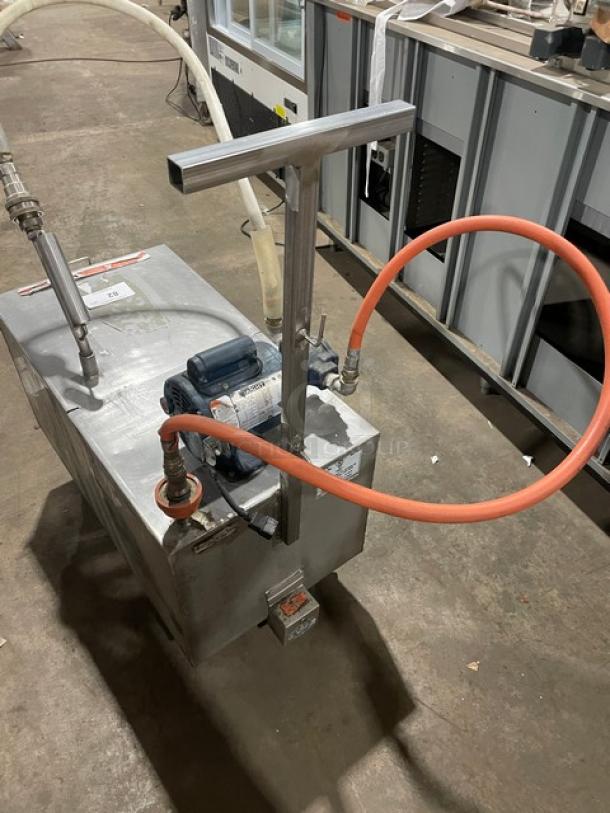 Darling Model 402 stainless steel electric oil filter/caddy, 175 lb. capacity, 120V, on casters, hoses attached.