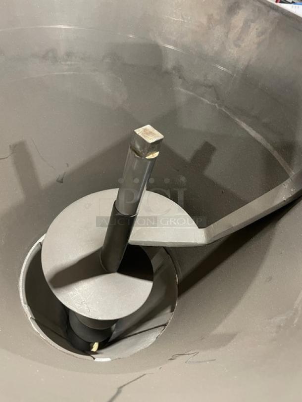 Commercial stainless steel electric vacuum stuffer/filler, free-standing, on casters, interior view, excellent condition.