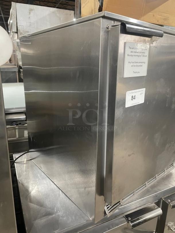 Beverage-Air UCR27Y stainless steel undercounter refrigerator, single door, poly coated rack, clean condition, model label visible.