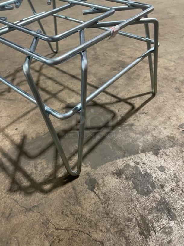 Winholt W1014 commercial wired steel display stand, 10"x14", 500 lb. capacity, on legs, new condition.
