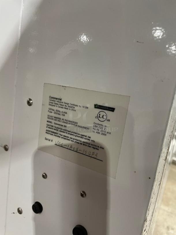 Urban Cultivator Commercial model 001 indoor garden, double glass doors, electric-powered, 120V, on casters. Serial: VCC-1804-104P3.