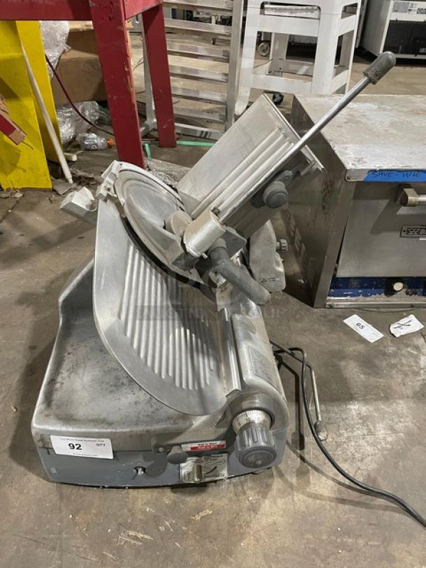 Hobart Model 2712 semi-automatic meat slicer, electric, countertop, 120V, used condition, visible controls and power cord.