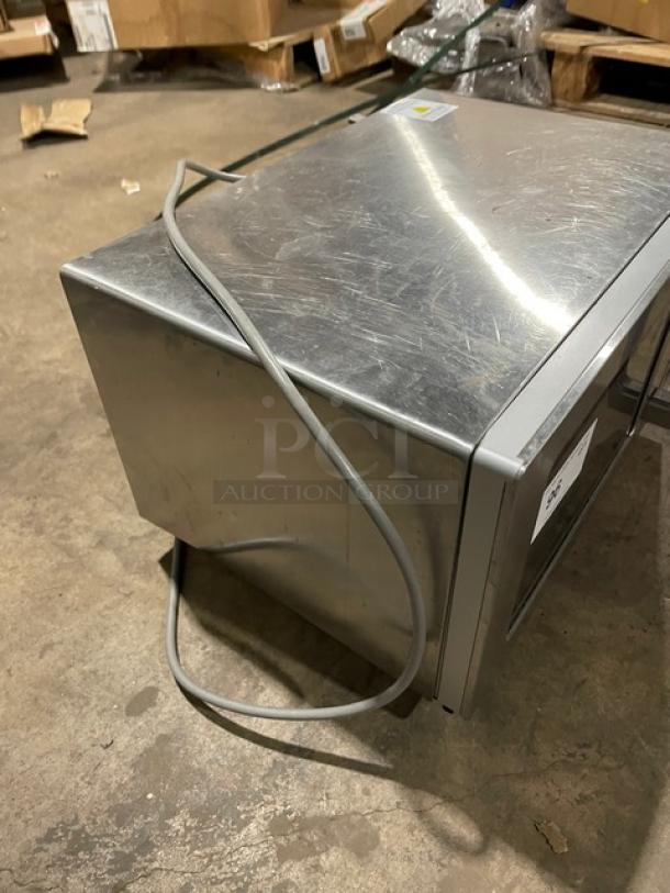 Solwave 2023 commercial stainless steel countertop microwave, model 180MW1000SS, with digital control and power cord.