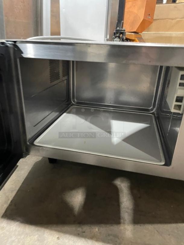 Solwave 2023 commercial stainless steel microwave oven, model 180MW1000SS, digital controls, 120V 1 Phase, on legs.