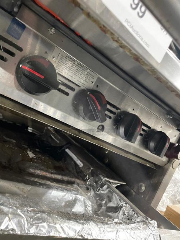 MagiKitch'n 624H stainless steel gas countertop char broiler, visible control knobs, used condition, SN: MCB20924A0002.