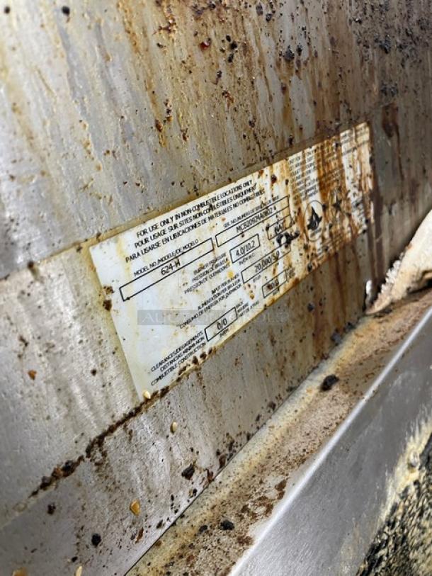 MagiKitch'n 624H stainless steel char broiler, natural gas, commercial countertop model. Visible SN: MCB20924A0002, used condition.