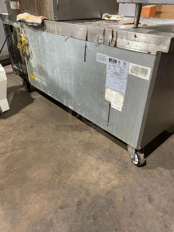 Arctic Air ARCB60CZ stainless steel 2-drawer refrigerated chef base, 62", on casters, visible wear, 115V, model and serial labels.