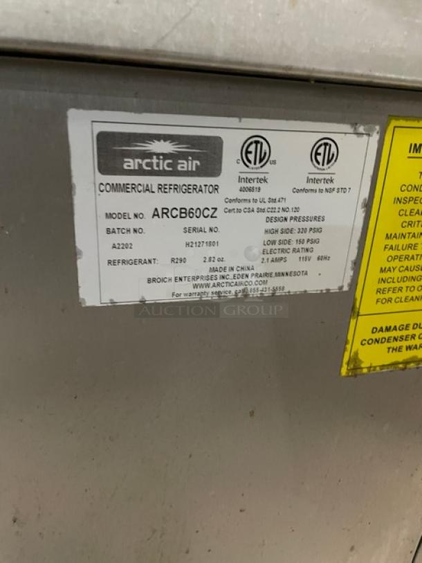 Arctic Air ARCB60CZ refrigerated chef base, stainless steel, 62", 2 drawers, on casters, model tag with serial H21271801.