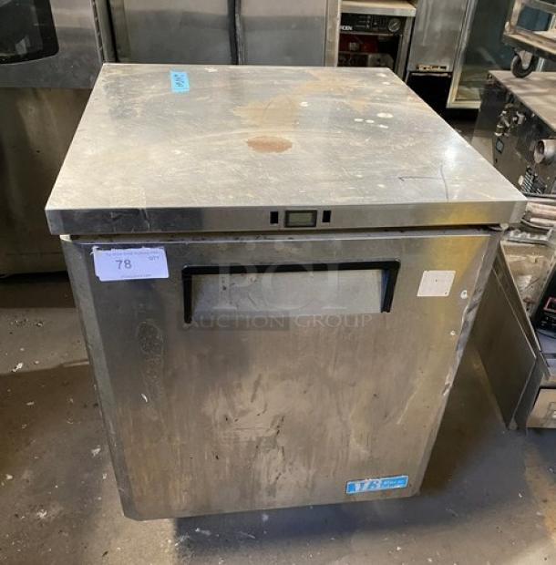Delfield stainless steel single door undercounter refrigerator, model 406CA-DHL-DD1, on casters with wired rack.