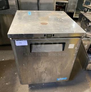 Delfield stainless steel single door undercounter refrigerator, model 406CA-DHL-DD1, on casters with wired rack.