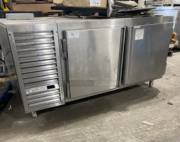 Traulsen stainless steel 2-door undercounter refrigerator, model UC2HT, with pan slide, chrome rack, on legs. Serial T276920J98.