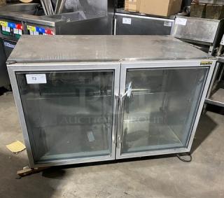 Silver King SKF48G commercial stainless steel undercounter freezer with double glass swing doors. Model SN: SAJF69736B. 115V.