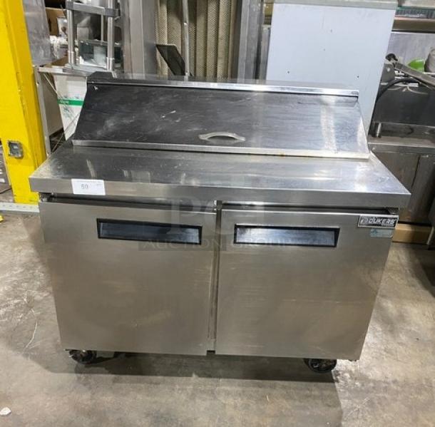 Dukers DSP48 stainless steel salad/sandwich prep table, bain marie style, on casters, with wired rack, SN 154020DUK190604190800657.