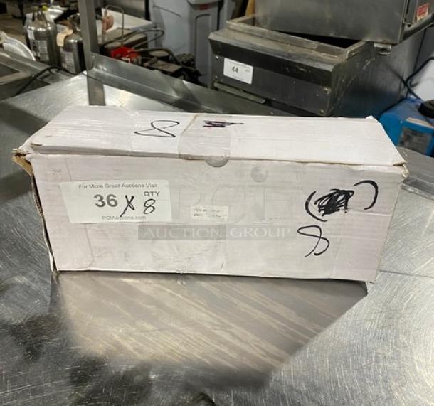 Boxed Crestware SP02 commercial stainless steel 2 oz. portion control spoon with red grip. New condition.