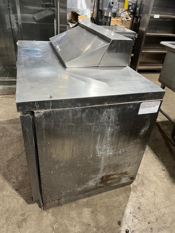 Continental SW48N8 2-door stainless steel refrigerated prep table, 48", with poly-coated rack, used condition, model SN: 159A8997.