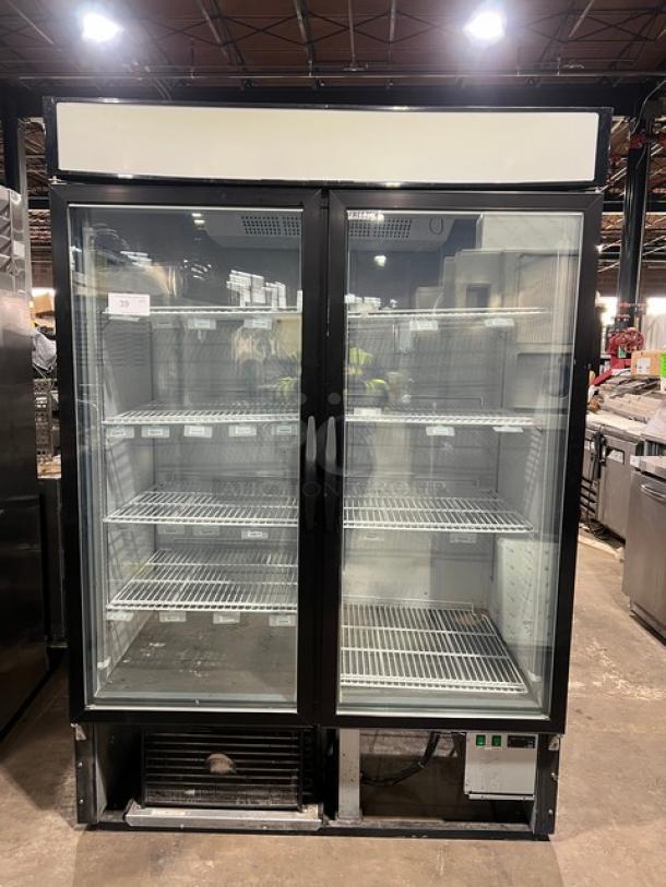 Maxx Cold commercial black double glass swing door reach-in merchandiser freezer, model MXM2-48F, with poly coated wired racks.