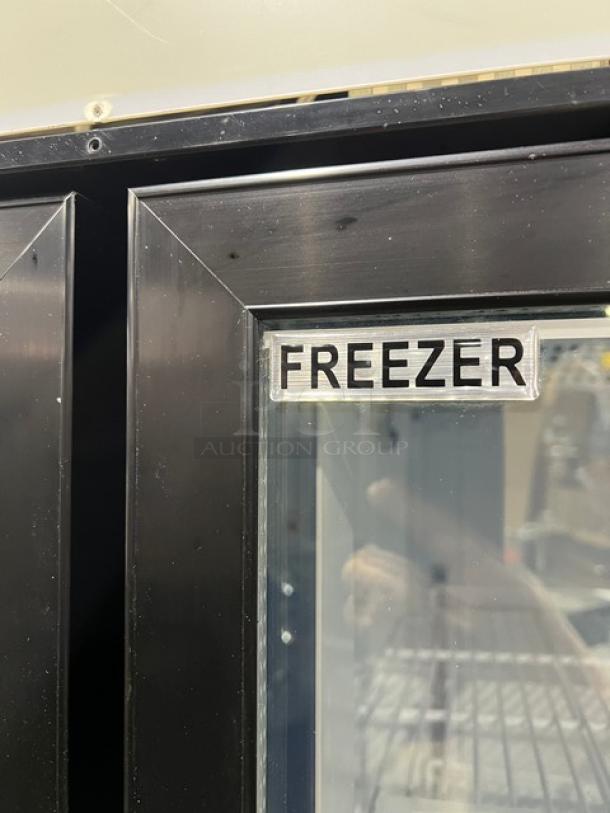 Maxx Cold commercial double glass swing door merchandiser freezer, Model MXM2-48F, black, with poly-coated racks.