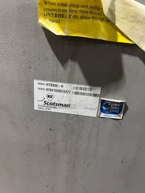 Scotsman CME256AS-1H ice maker, stainless steel, air-cooled, electric, 115V, 1 phase, with legs. Model and serial tags visible.