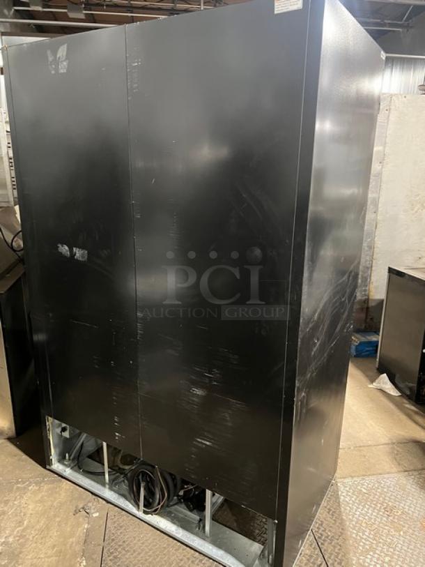 Beverage-Air MarketMax Series commercial refrigerator, model MMR49-1-B-LED-EL, black exterior, some wear visible.