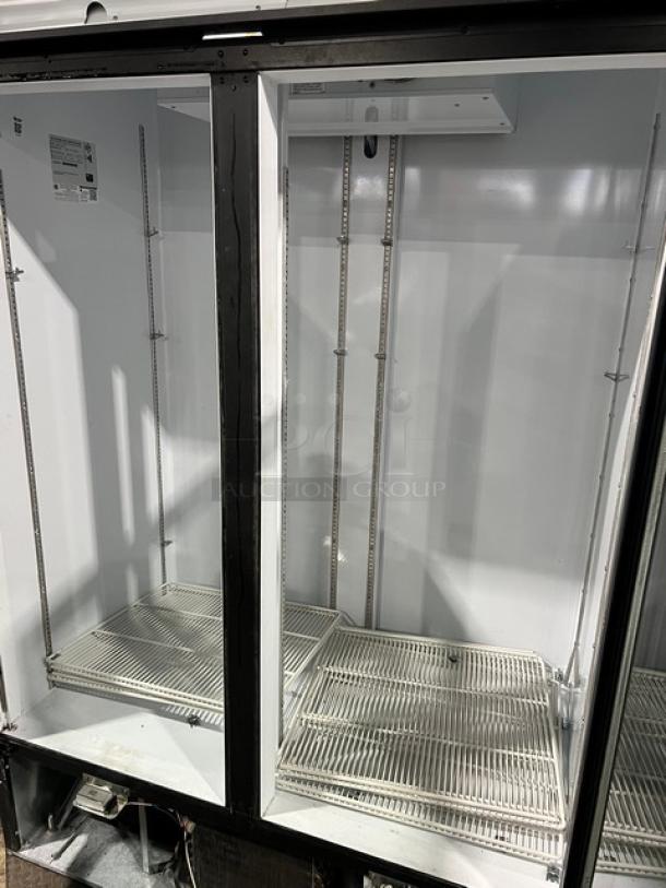 Beverage-Air MarketMax black double glass door refrigerator, model MMR491BLEDEL, with poly-coated wired rack, clean interior.
