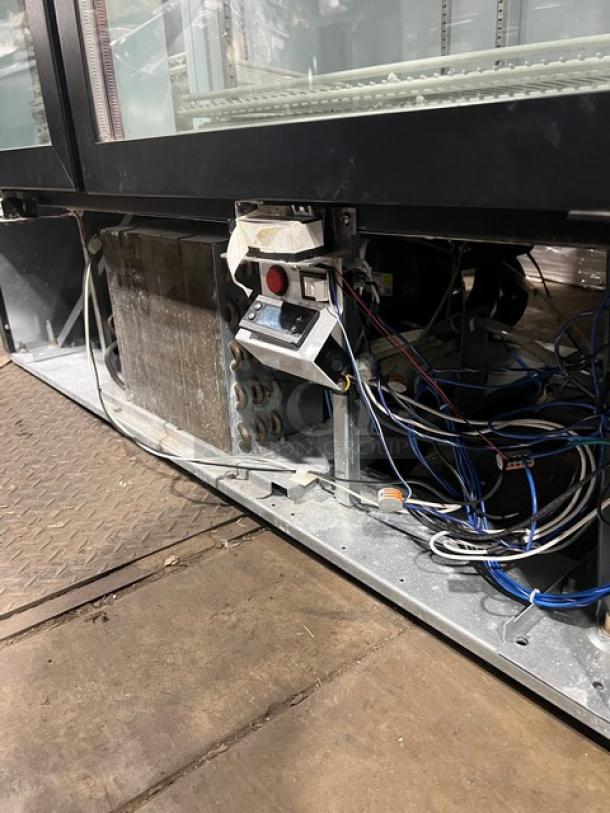 Beverage-Air MMR491BLEDEL merchandiser refrigerator, black, double glass doors, poly coated rack, 115V, visible wiring.