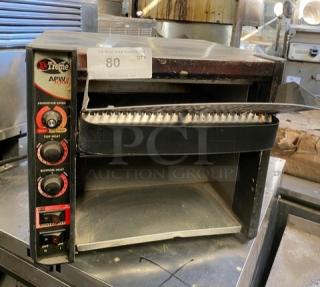 APW Wyott XTRM3H commercial stainless steel conveyor toaster, 13" wide belt, 3" opening, adjustable heat controls, used.
