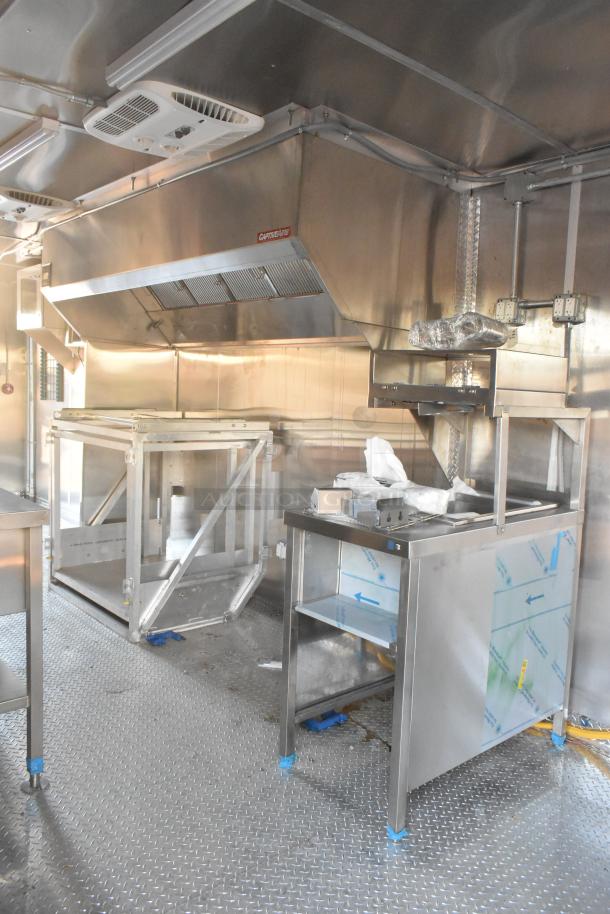 Brand new 2021 Cruising Kitchens 24' Burger King mobile kitchen, featuring CaptiveAire hood, fire suppression, and commercial equipment.
