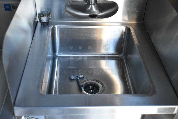 Stainless steel sink in brand new 2021 Cruising Kitchens 24' Burger King fast food trailer, featuring commercial-grade equipment.