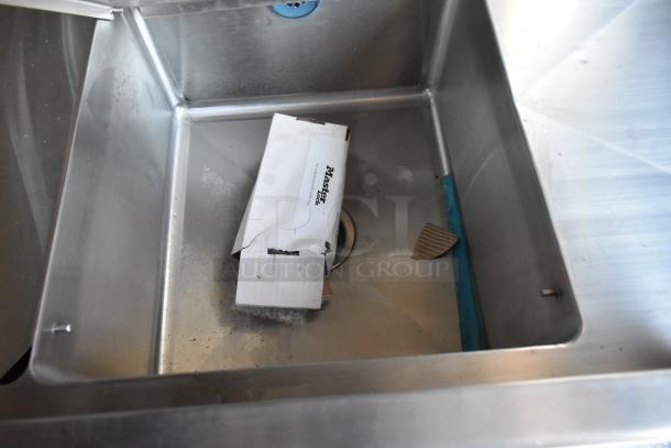 Stainless steel sink inside 2021 Cruising Kitchens Burger King mobile kitchen trailer, featuring unused appliances.