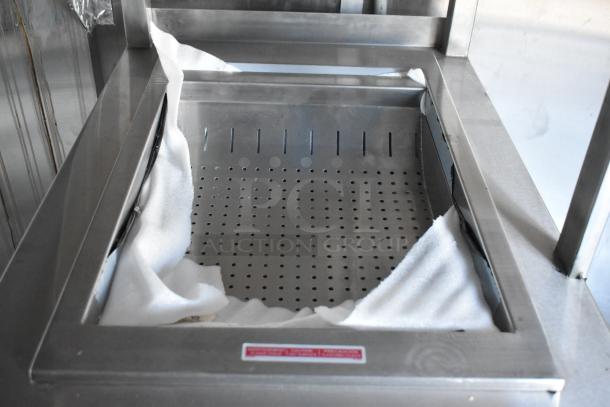 Brand new 2021 Cruising Kitchens 24' Burger King mobile kitchen interior with stainless steel equipment and protective foam.